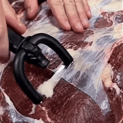 Handheld fat trimmer removing surface fat