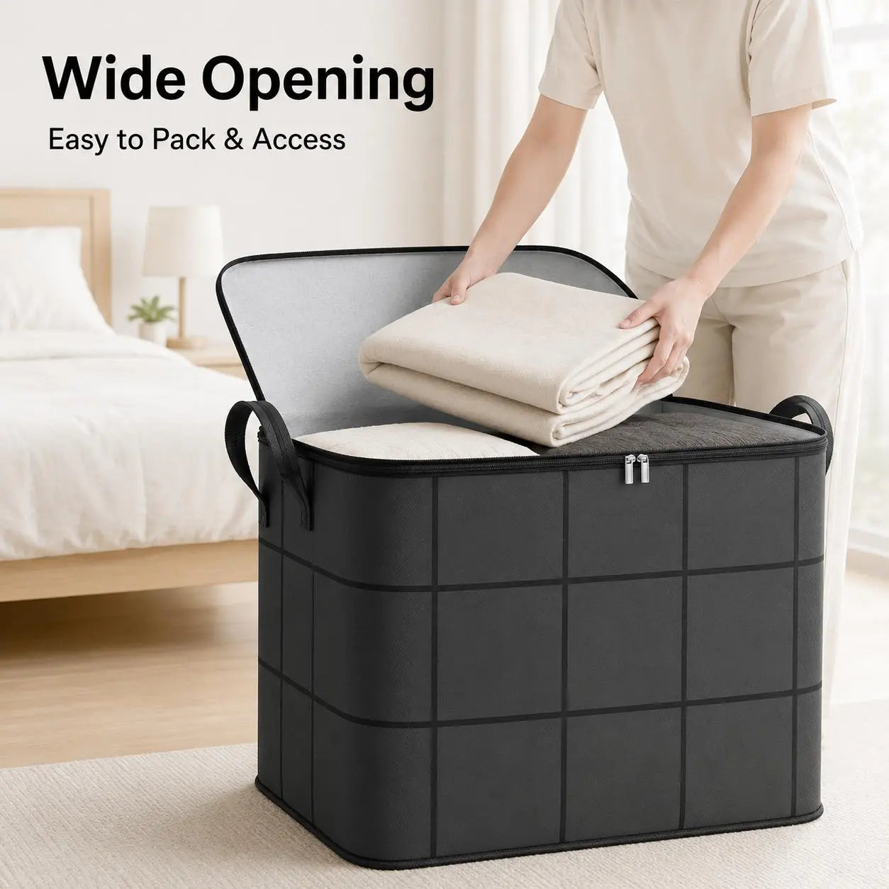 Wide opening storage bin being filled with folded bedding
